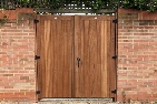 Sapele hardwood gates treated brown, rear view