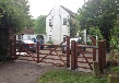 Hardwood gates treated in light brown