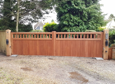 Sapele Classic gates, brown treated on underground automation system