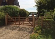 Hardwood gates treated in light brown